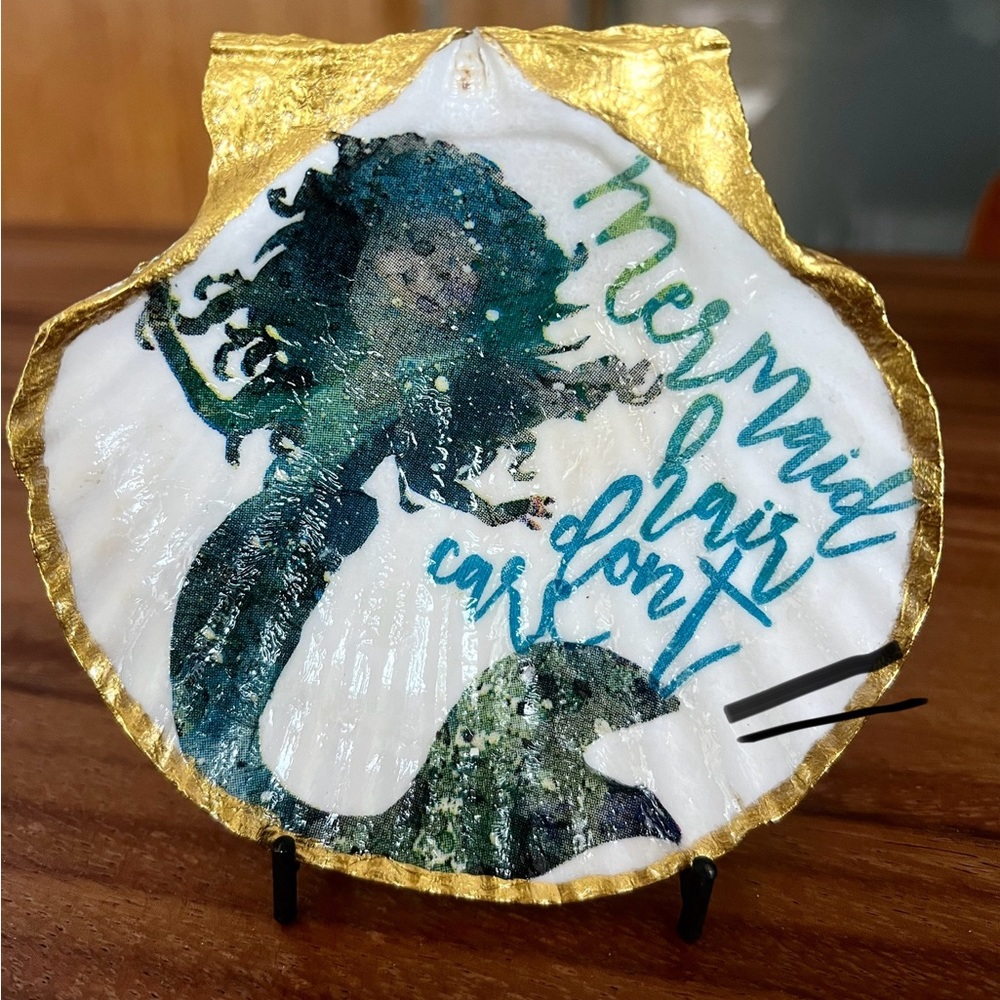 Handmade mermaid decoupage onto natural scallop seashell